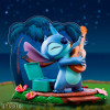 Disney : Lilo & Stitch - Figurine SG Stitch Guitare 10 cm MODELE D'EXPOSITION