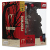 Welcome to Derry - Statue PVC Movie Maniacs Pennywise (Gold Label) 16 cm profil de la boîte